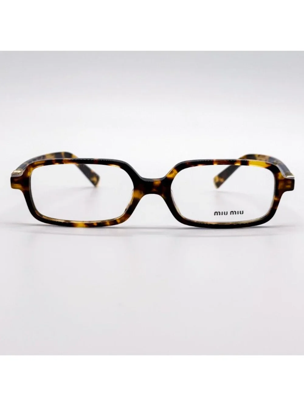 Miu Miu length temple width